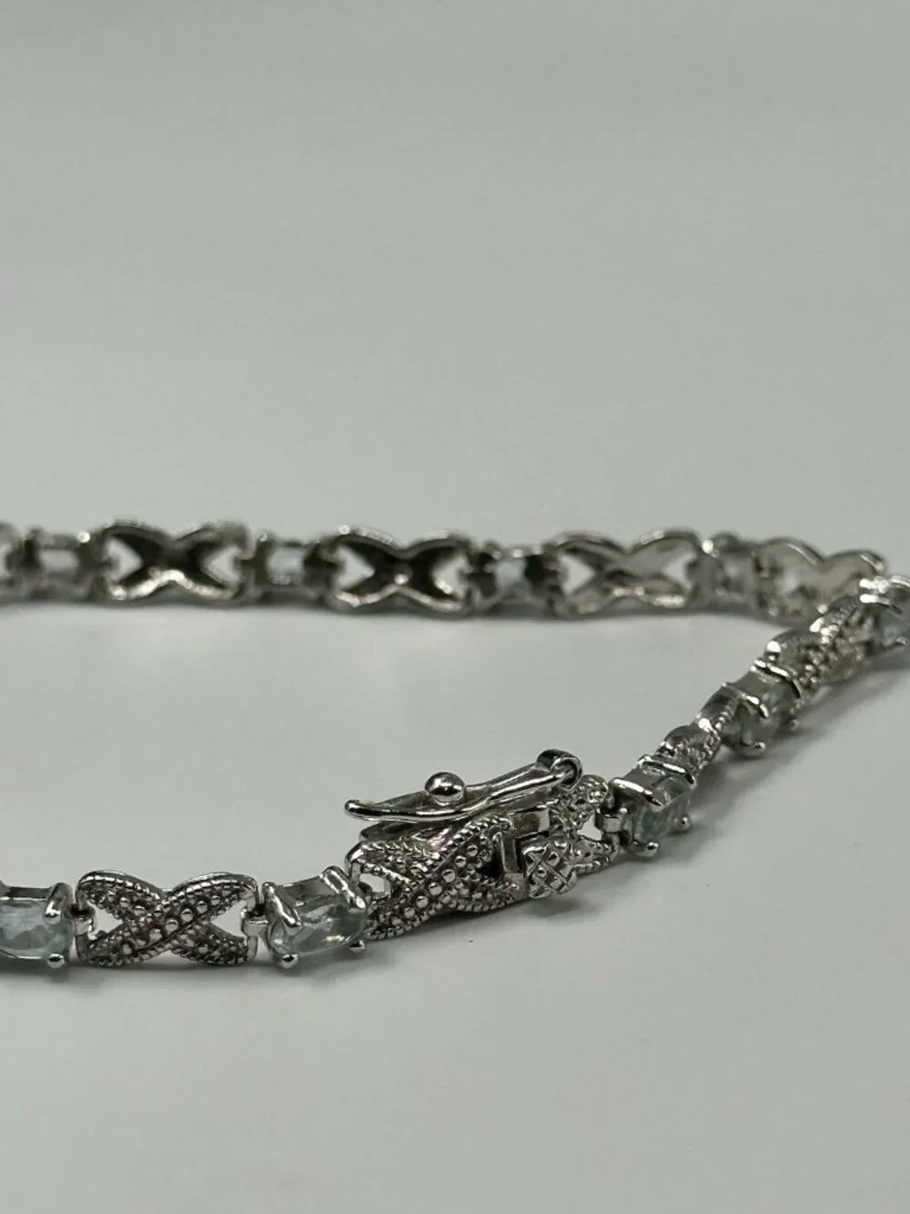 Infinity Link Tennis Bracelet Sterling Silver Blue Oval Stones 8 Grams 7.25”
